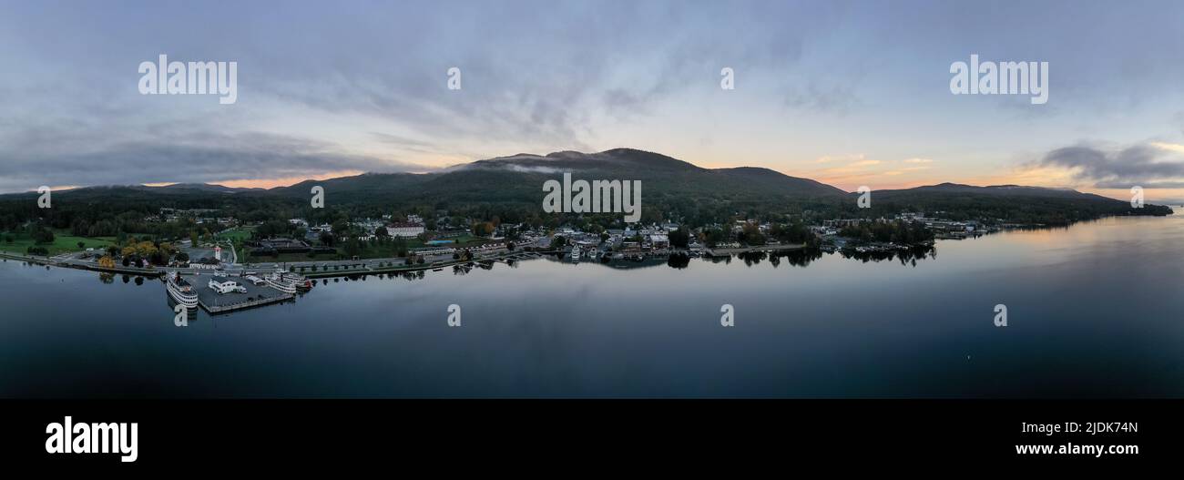 Lake George, New York - October 10, 2021: Tourist boats in the bay in Lake George, New York at dawn. Stock Photo