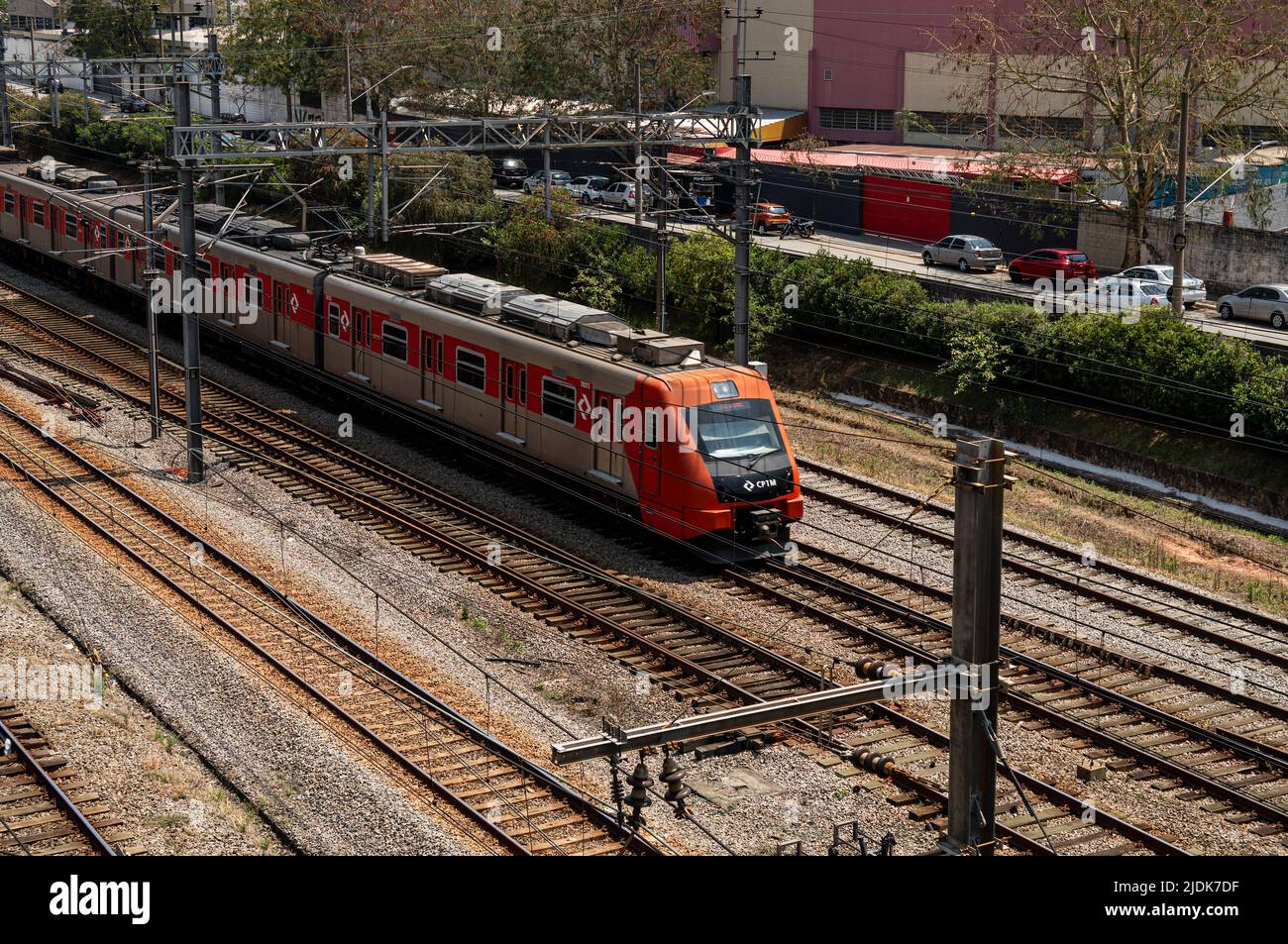 Train tracks of CPTM Line 7 (Ruby line) nearby Palmeiras-Barra Funda station in a sunny day with Gustav Willi Borghoff street at the back. Stock Photo