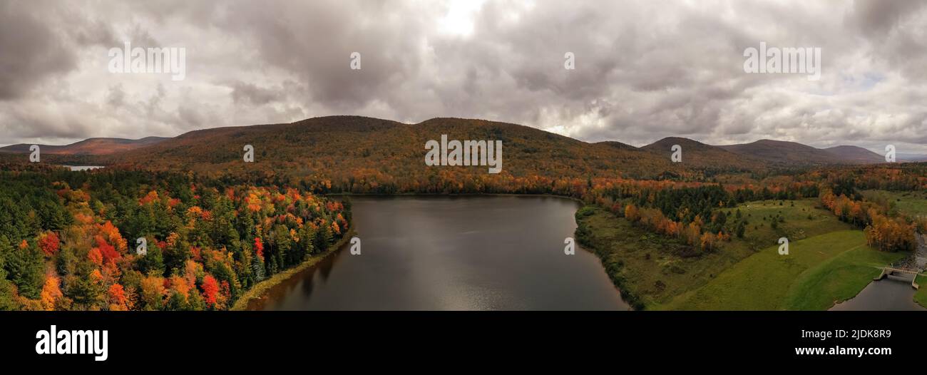 Colgate Lake in Upstate New York during peak fall foliage season. Stock Photo
