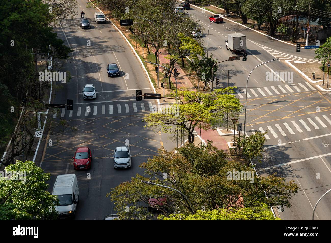 Aerial view of both ways Paulo VI avenue with a bicycle lane running on the median strip, between both ways traffic in a normal sunny business day. Stock Photo