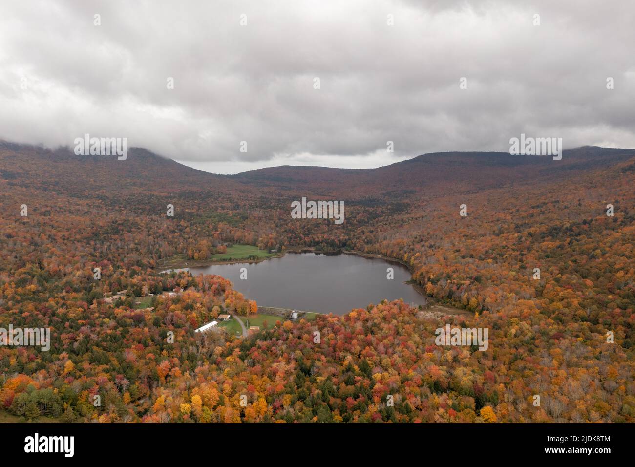 Colgate Lake in Upstate New York during peak fall foliage season Stock
