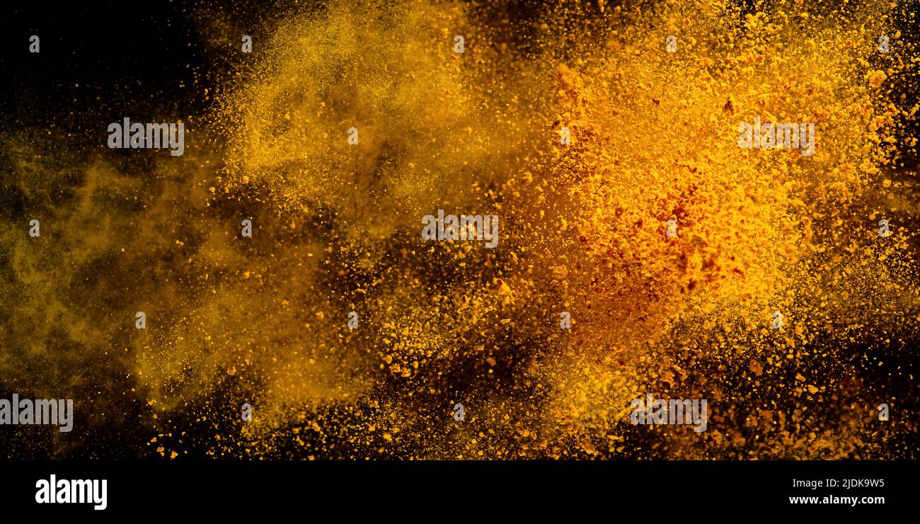 Turmeric Powder Splatter Explosion, Splashes of turmeric on a black background. India Seasoning ...