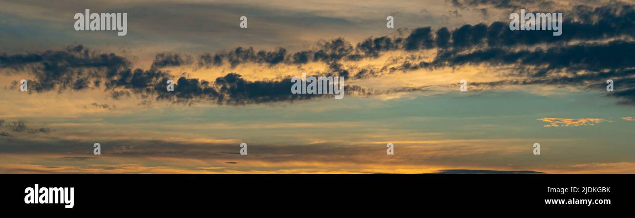 Evening sky with dramatic clouds over the sea. Dramatic sunset over the ...