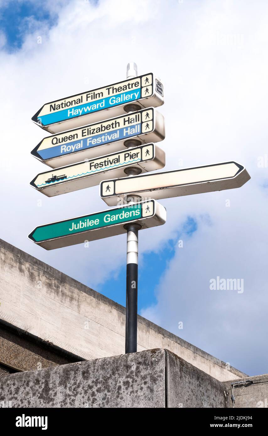 Low angle view of a directional sign post, for places of interest located on south bank near The Royal Festival Hall, London, UK. Stock Photo