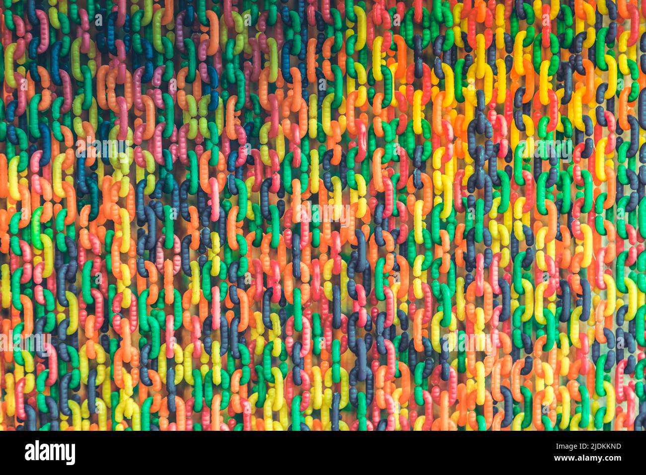 Colorful plastic chain background Stock Photo - Alamy