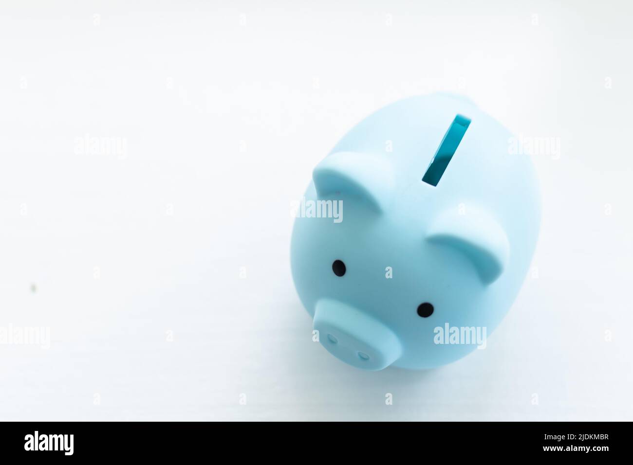 Piggy bank isolated on white background Stock Photo - Alamy