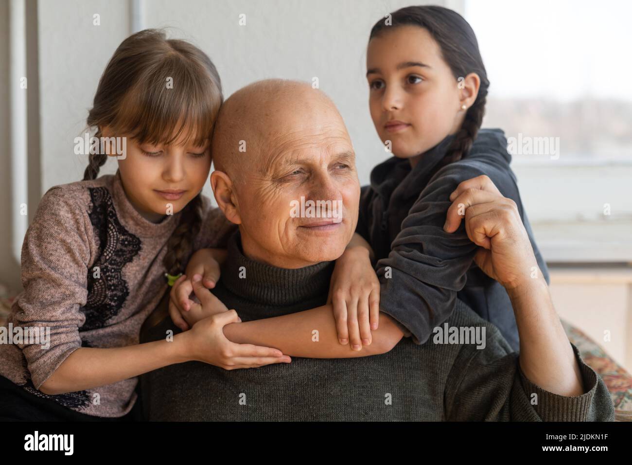 Hands of the old man and a child's hand Stock Photo - Alamy