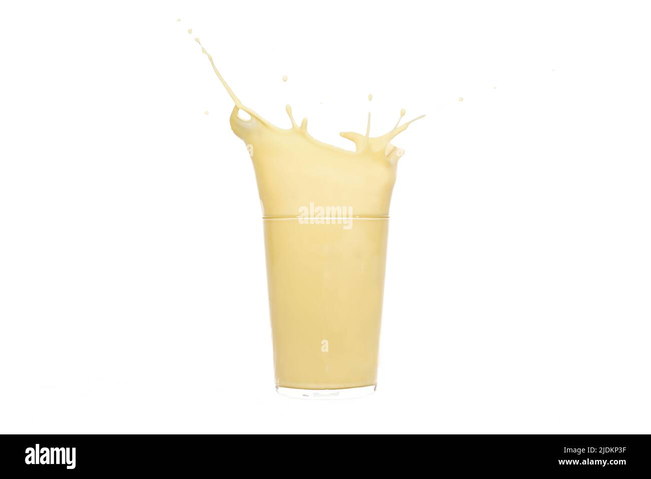 Close up of a glass of splashing banana juice Stock Photo