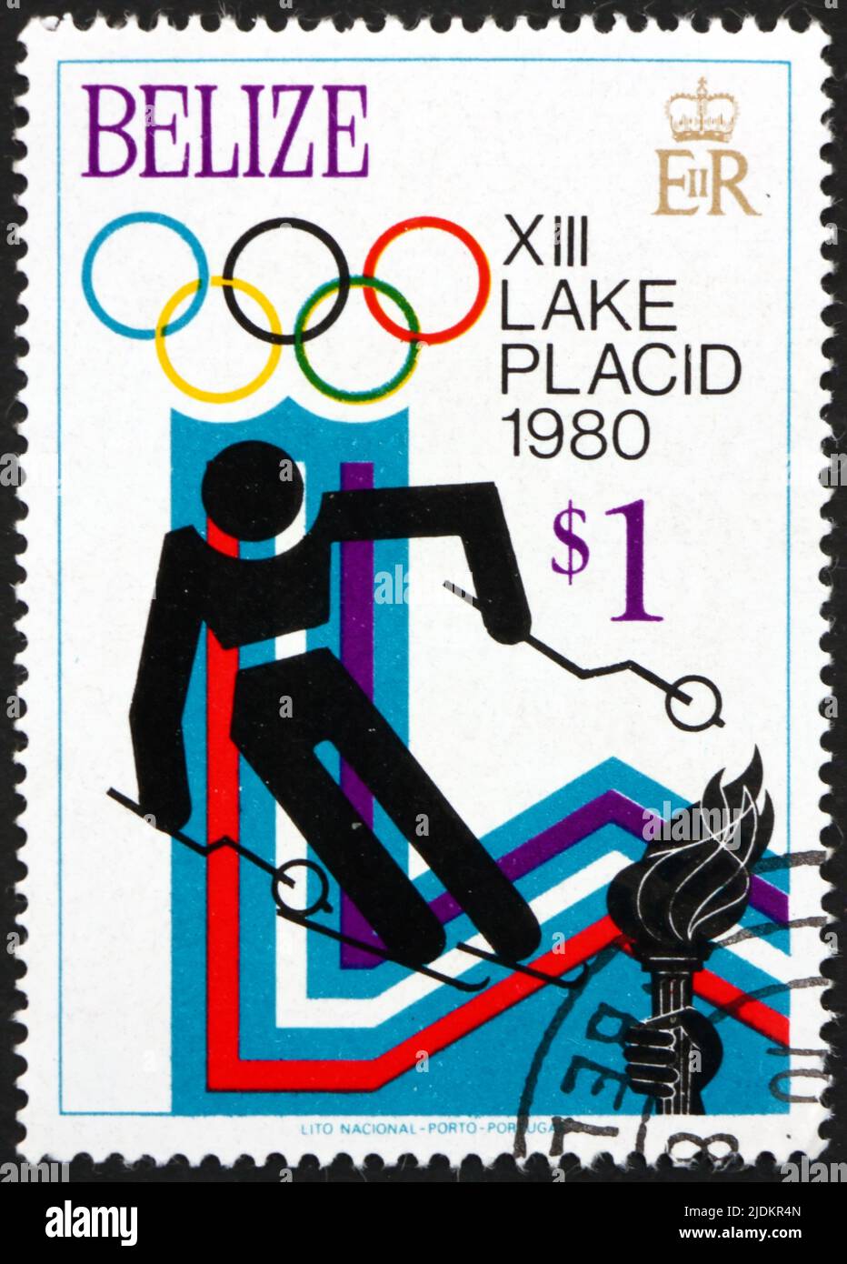 BELIZE - CIRCA 1979: a stamp printed in Belize shows Downhill skiing, 1980 Winter Olympics, Lake Placid, circa 1979 Stock Photo