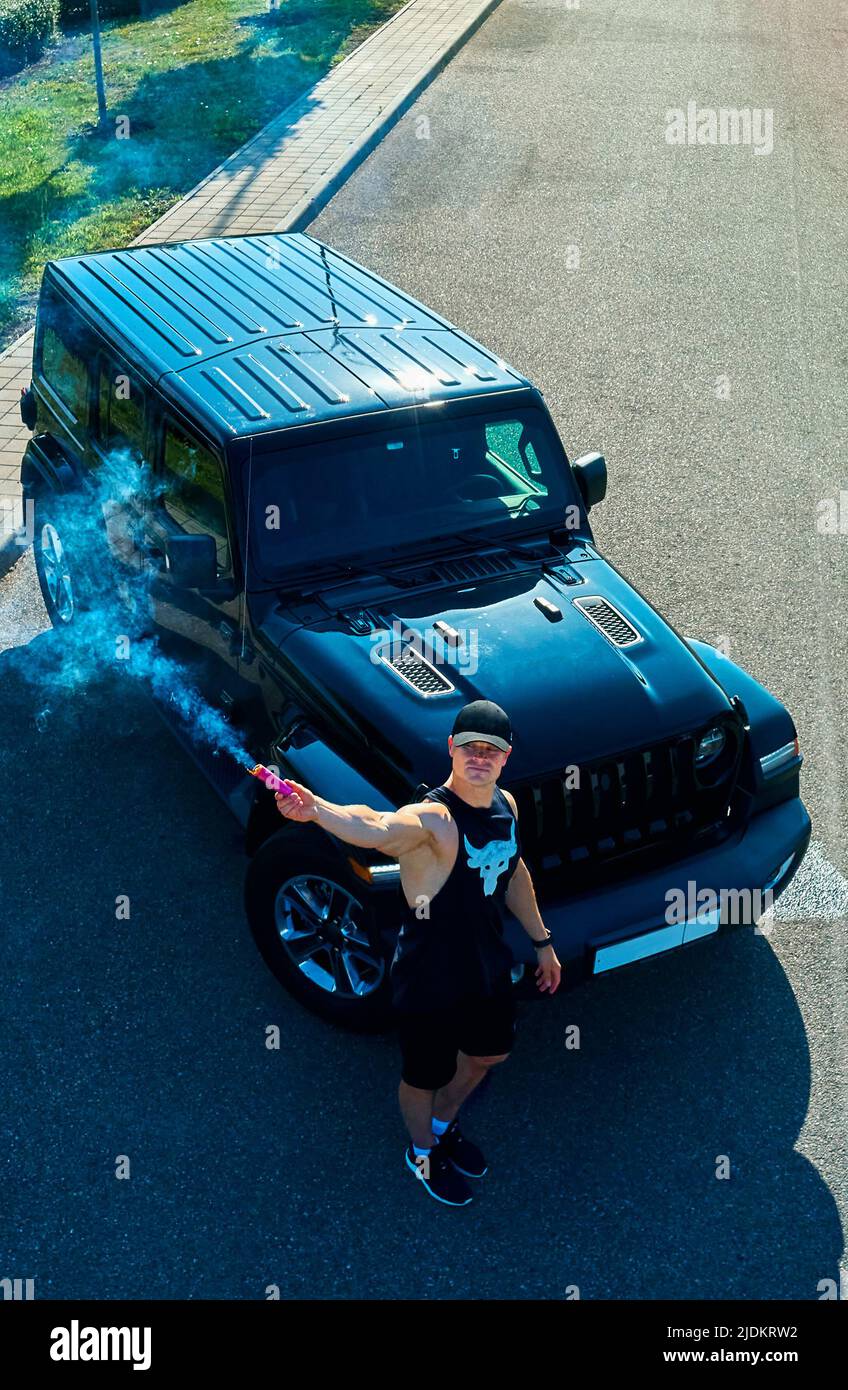 Man with smoke grenade hires stock photography and images Alamy