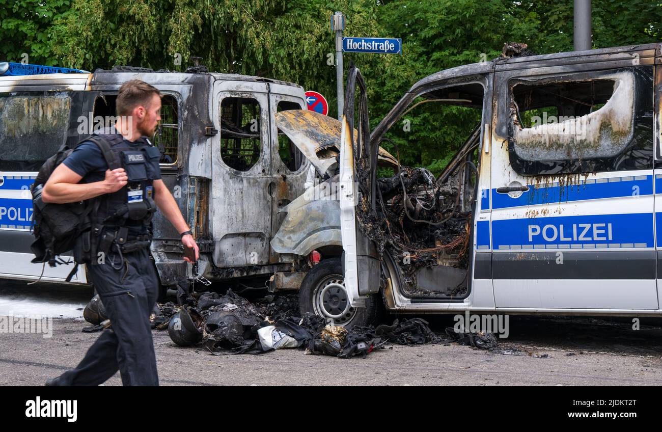 Munich, Germany. 22nd June, 2022. A policeman walks past police cars ...