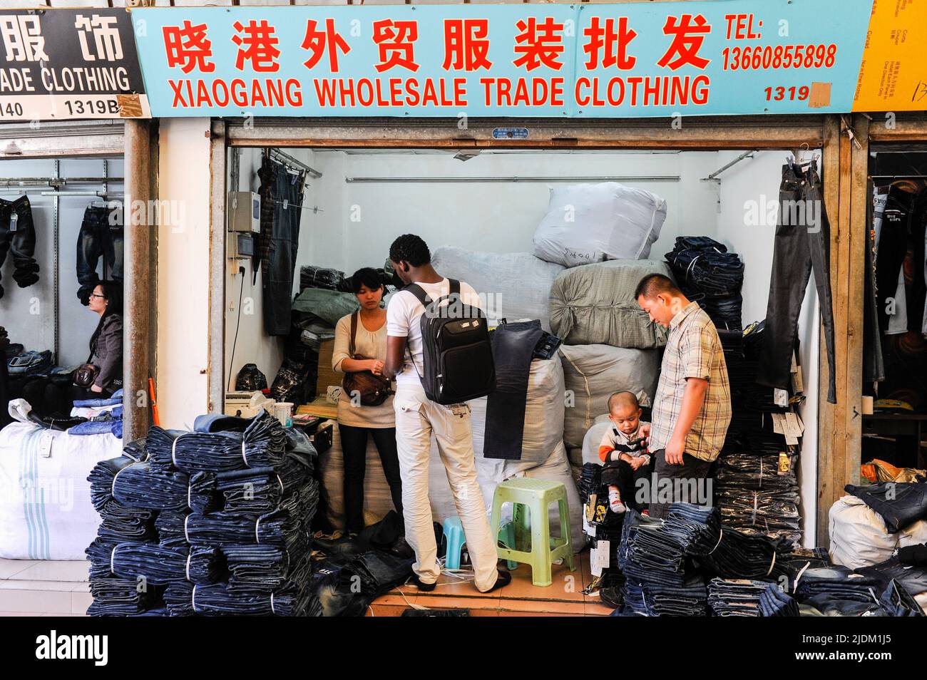 CHINA Guangzhou , Canaan Export Center for textiles , showroom for international buyer to order Jeans / CHINA , Provinz Guangdong , Guangzhou, Kanton, Canaan Export Center für Textilien, showroom mit Jeans für internationale Einkäufer, die Produktion findet um Guangzhou und in Shenzhen statt Stock Photo