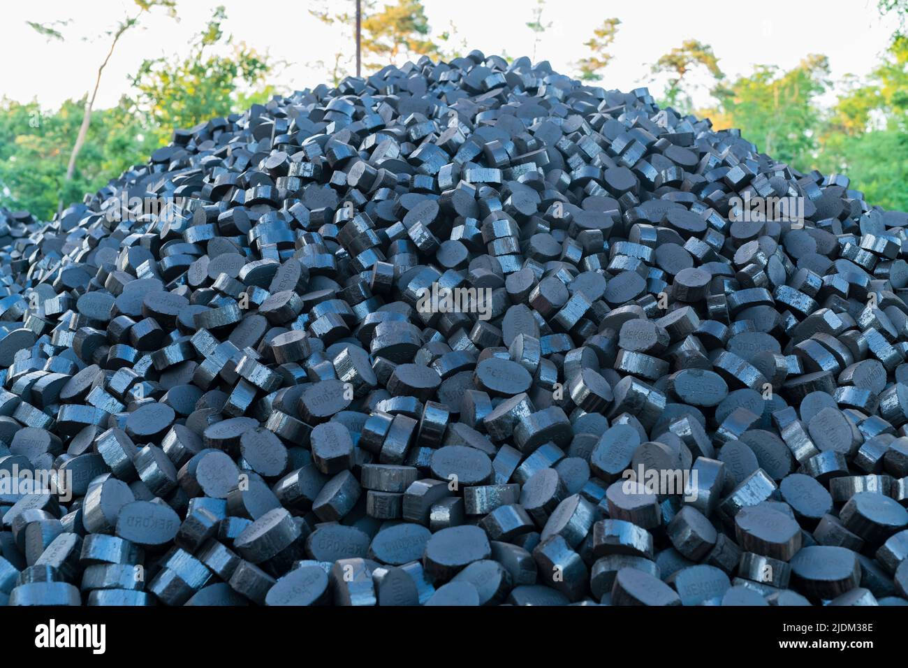 Germany , Calau , 21.06.2022 , A pile of coal briquettes of the company Rekord Stock Photo