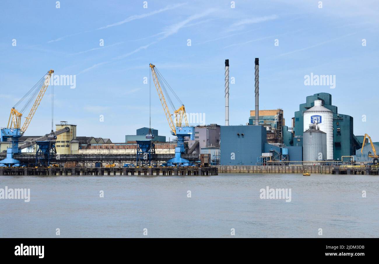 The former Tate and Lyle Sugar refinery on the River Thames at Silvertown in East London Stock Photo