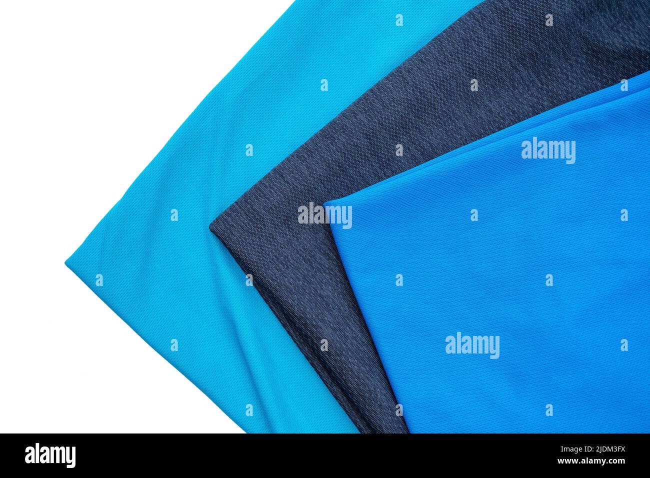 Three kind of blue polyester sport t shirts isolated on white, top view Stock Photo