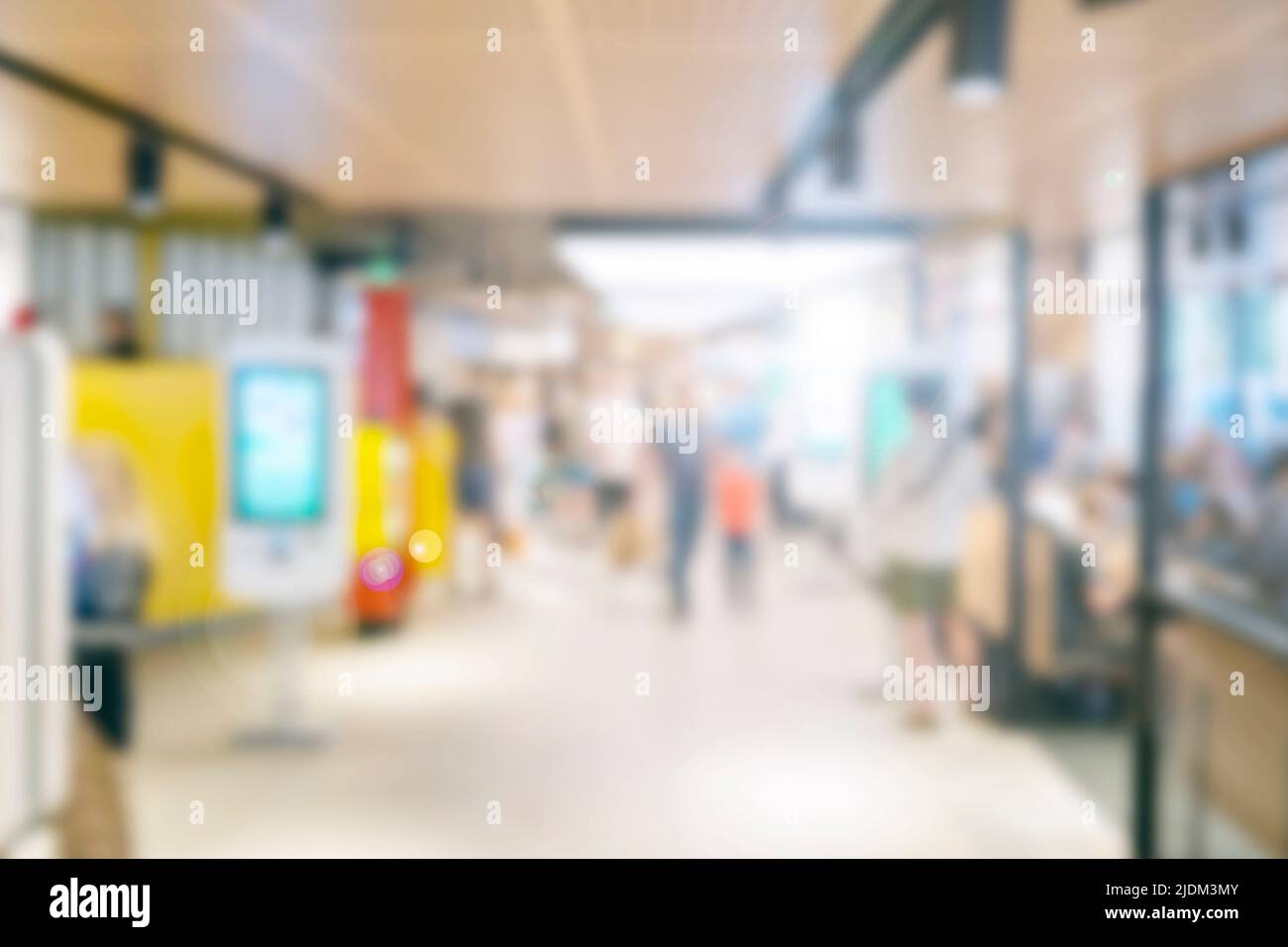 People at a cafe, shopping mall blurred defocused background Stock Photo