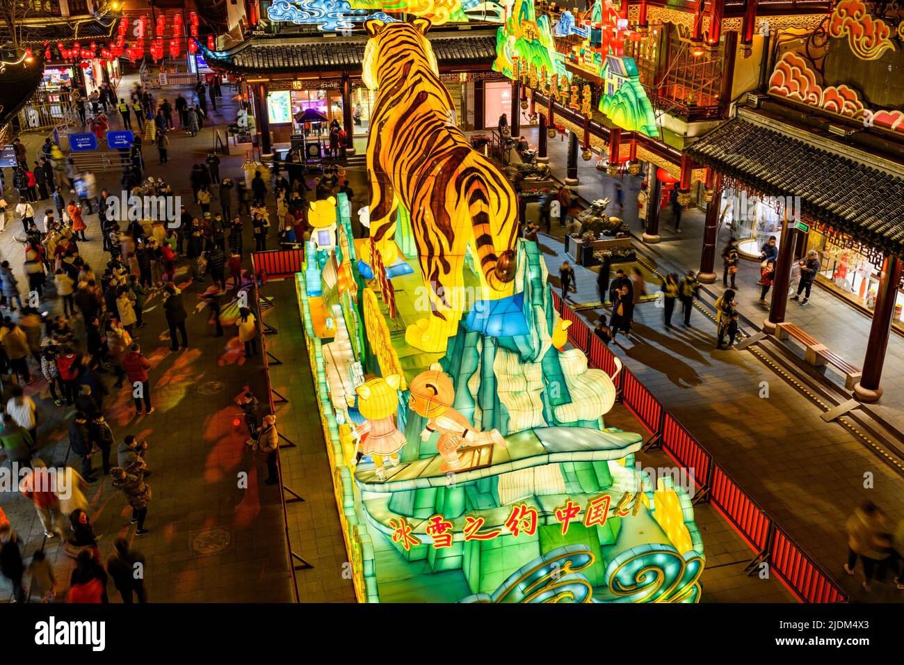 Tourists enjoy the lanterns display inside of Yu Yuan, Yu Garden