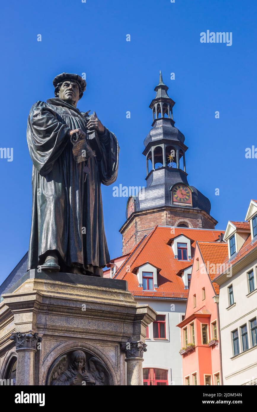 Statue of Martin Luther in front of the Andreas church in Eisleben, Germany Stock Photo