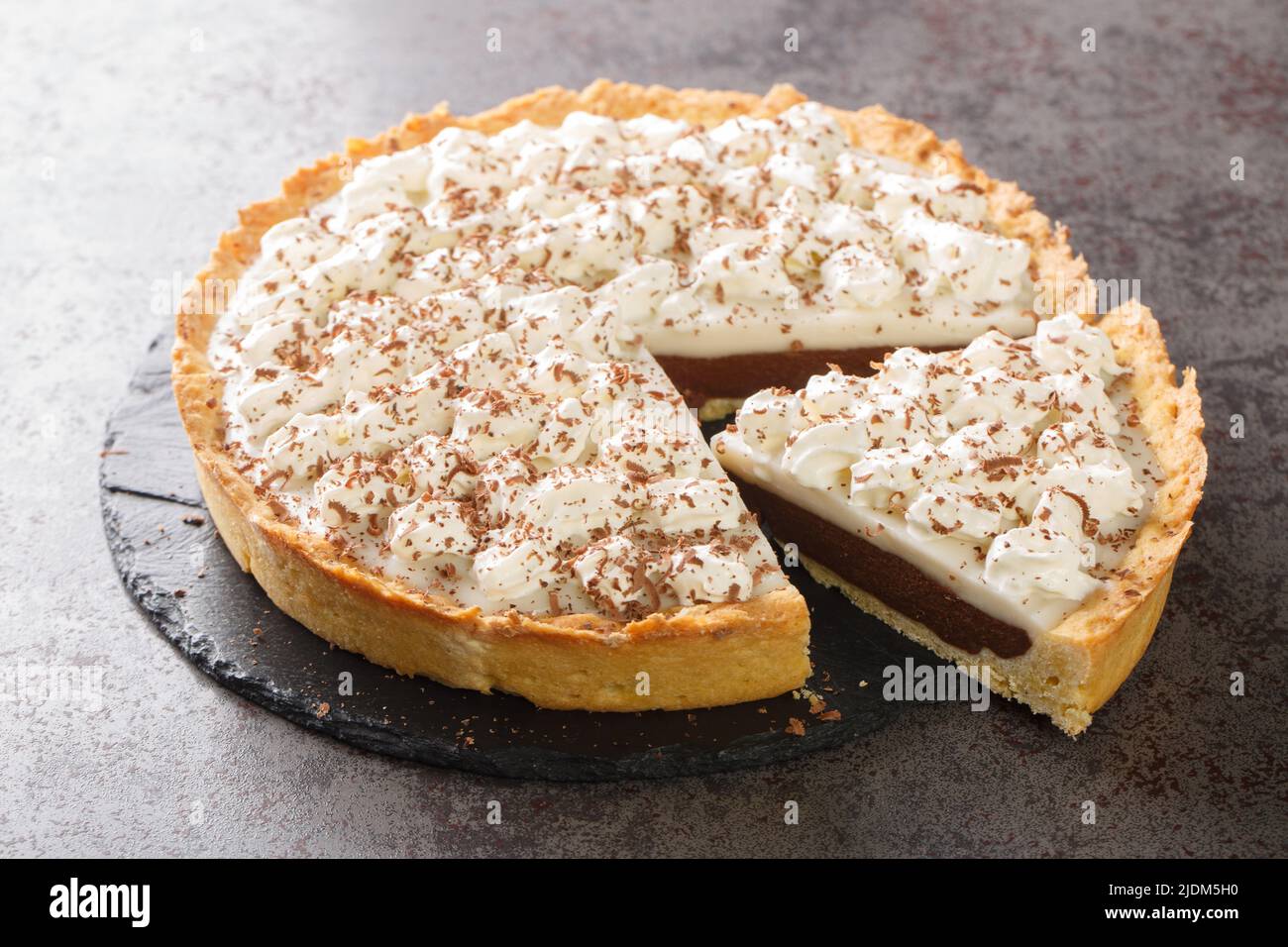 Chocolate Haupia Pie is a creamy coconut custard pie in a flaky pie