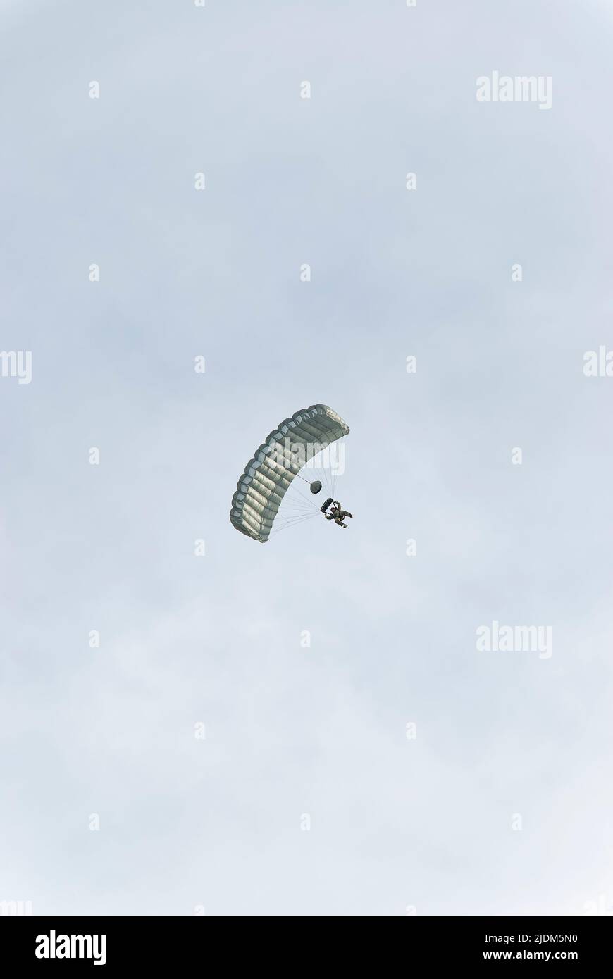 Commando Jump Paratrooper from below. Photo taken during the parachute jumping show ...