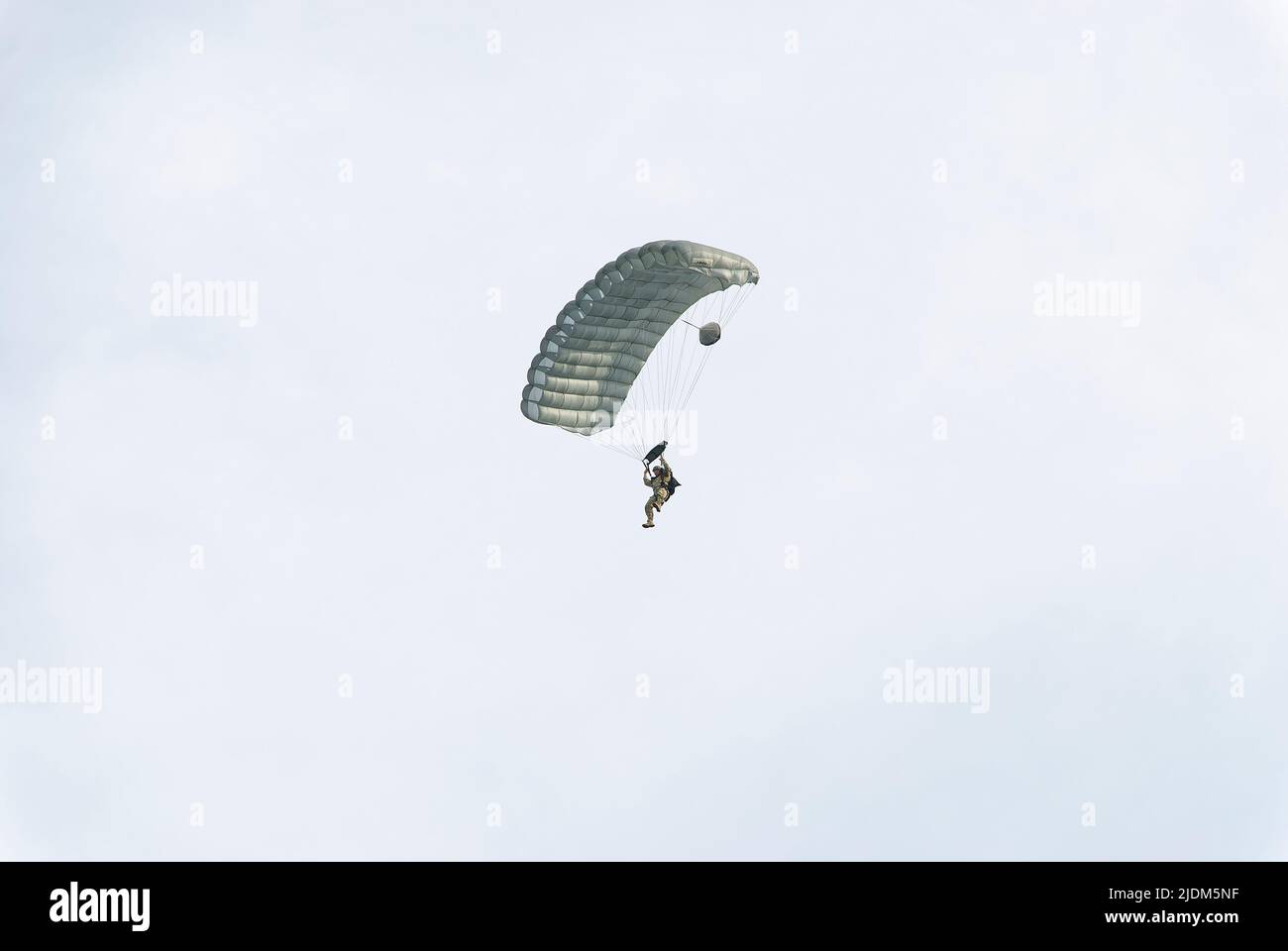 Paratrooper. Photo taken during the parachute jumping show during the Commando Fest in Dziwnów - August 2020. Stock Photo