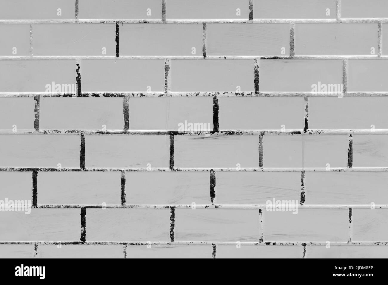 Old grey brick wall texture stone gray background Stock Photo - Alamy