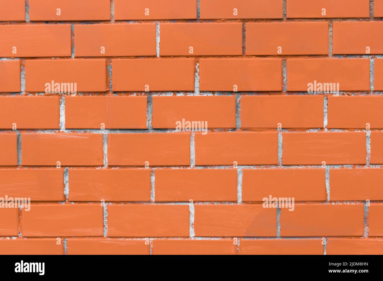 Old orange brick wall texture stone color background Stock Photo - Alamy