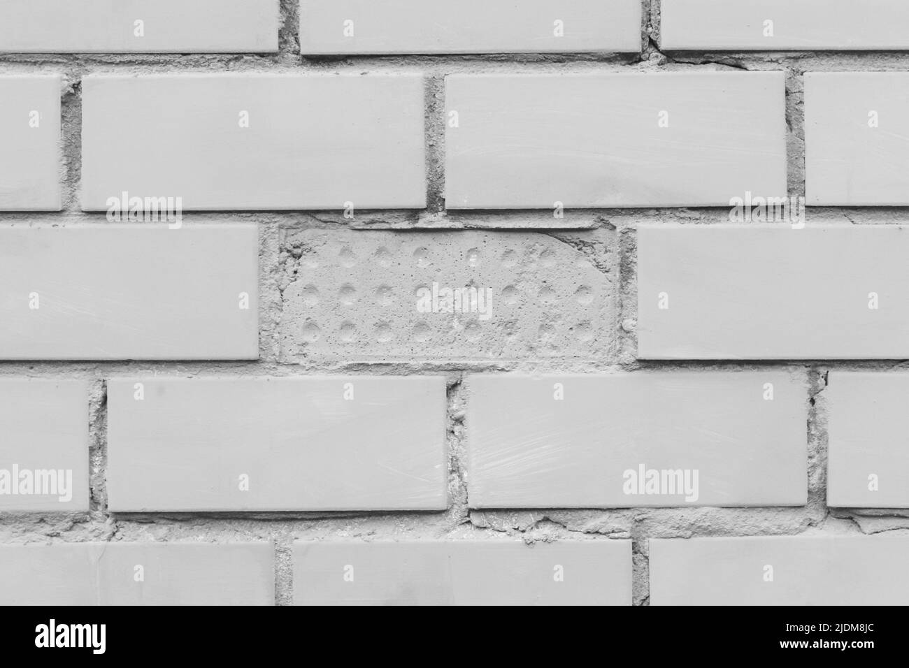 Old grey brick wall texture stone gray rough background Stock Photo - Alamy