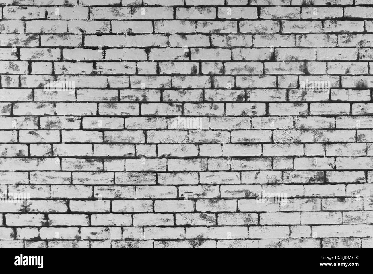 Grey brick wall of interior facade texture background architecture white. Stock Photo