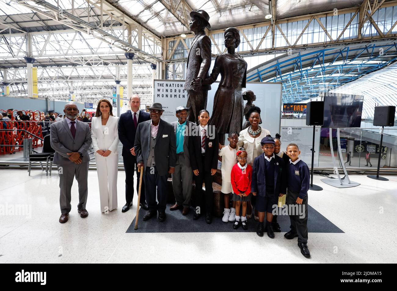 The Duke and Duchess of Cambridge, accompanied by Baroness Floella Benjamin, Windrush passengers Alford Gardner and John Richards and children at the unveiling of the National Windrush Monument at Waterloo Station, to mark Windrush Day. The statue - of a man, woman and child in their Sunday best standing on top of suitcases - was designed by the Jamaican artist and sculptor Basil Watson. Picture date: Wednesday June 22, 2022. Stock Photo