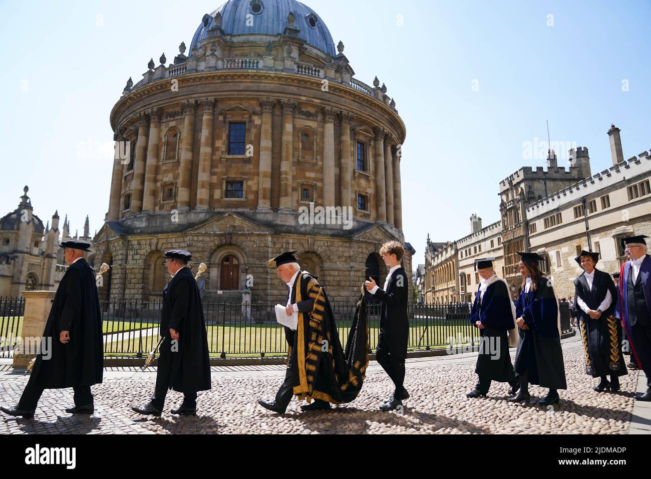A procession makes its way to the Sheldonian Theatre, Oxford, ahead of
