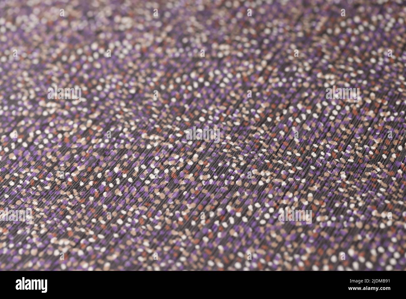 Dark fabric with colourful spots texture background Stock Photo