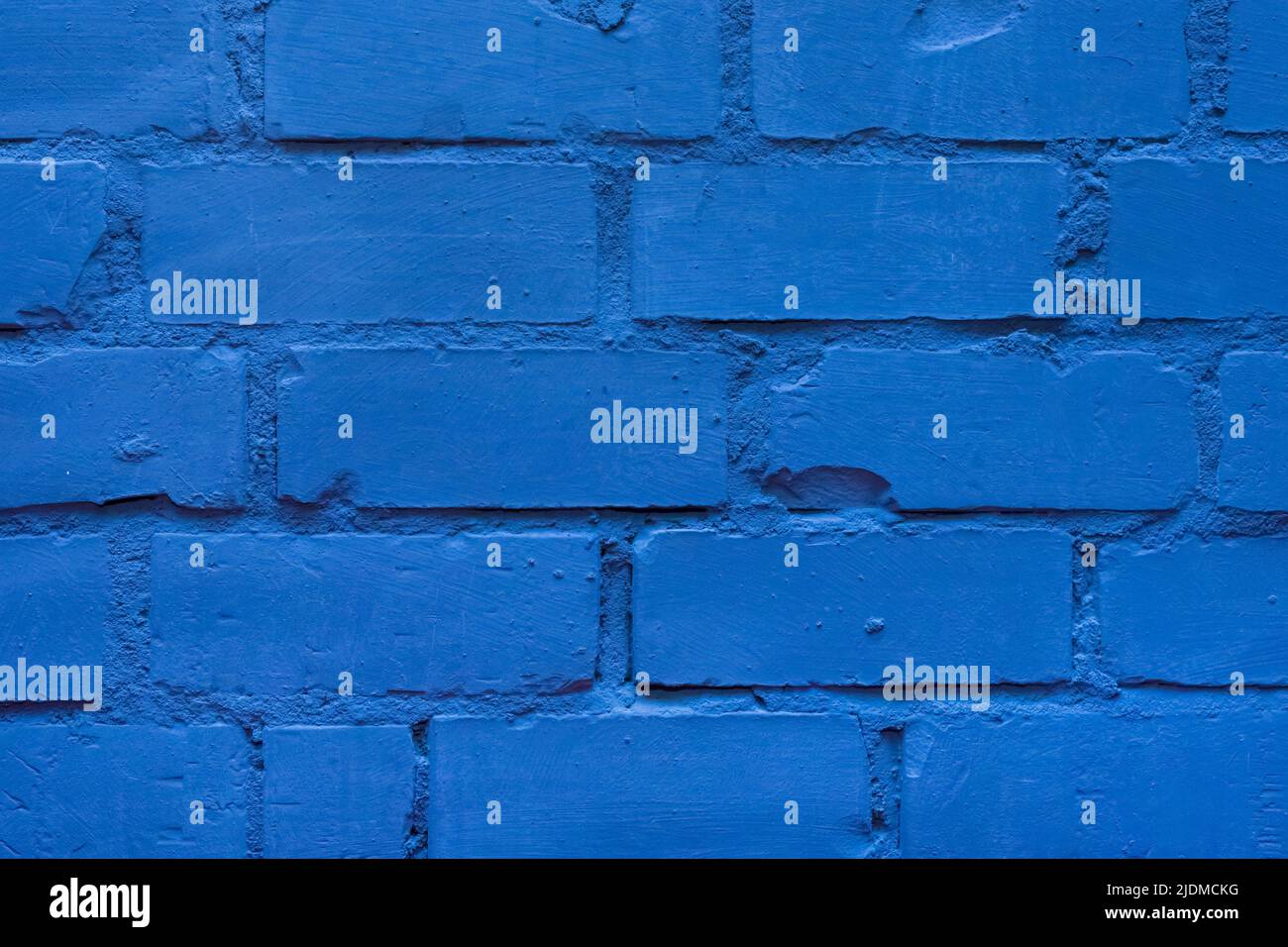 Blue paint brick wall of interior facade texture background