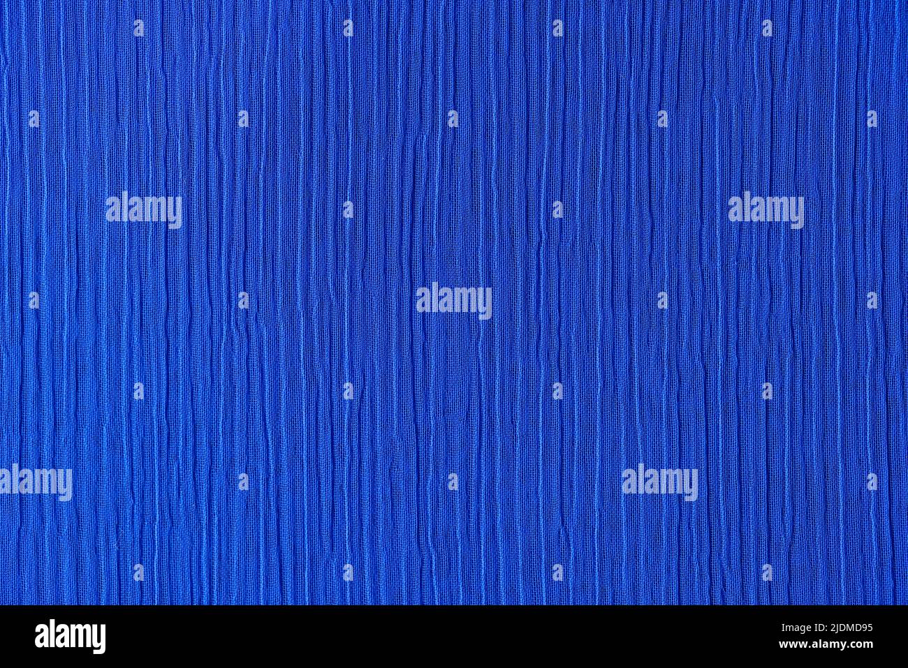Dark blue crinkled and crumpled fabric texture Stock Photo