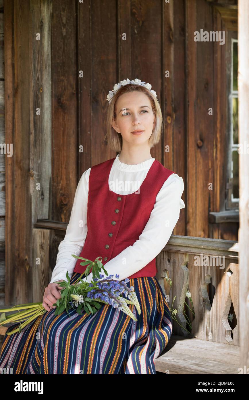 Latvian woman in traditional clothing. Ligo folk. Stock Photo