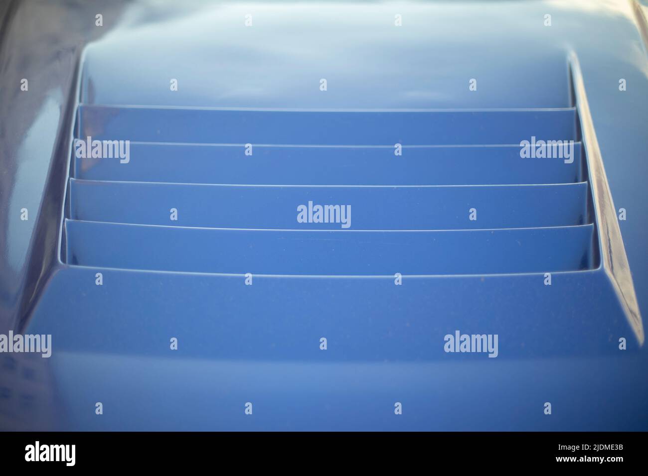 Spoiler on car. Blue hood. Transport details. Sports car Stock Photo Alamy