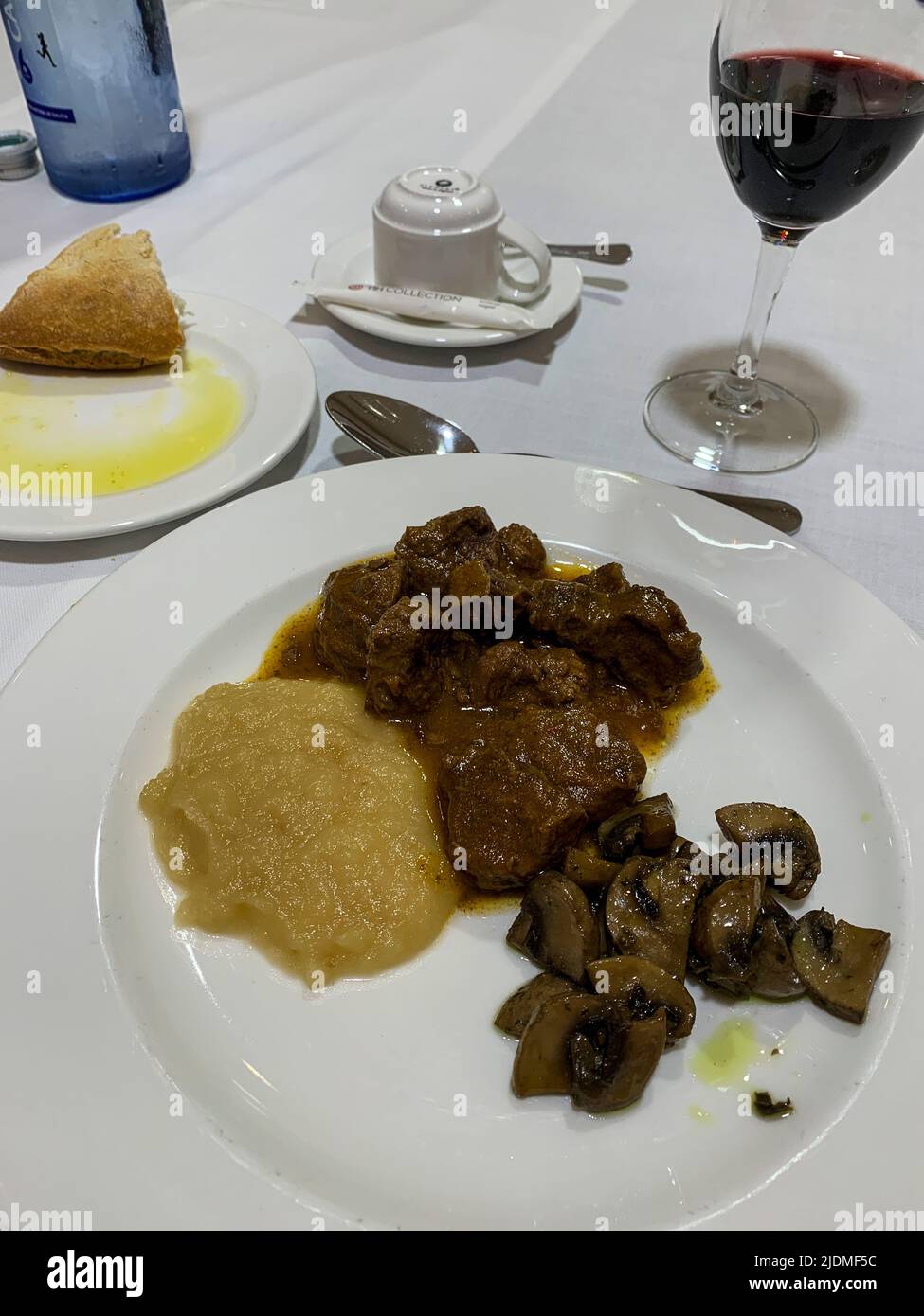 Spain, Spanish Cuisine. Leon. Veal Cheeks with Applesauce and Mushrooms. Stock Photo