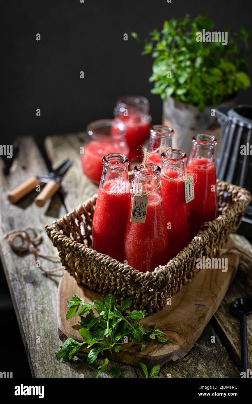 Fresh watermelon juice in glass bottles morning breakfast Stock Photo