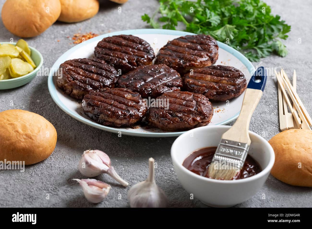 Delicious grilled cutlets and fresh buns for cooking burgers, food