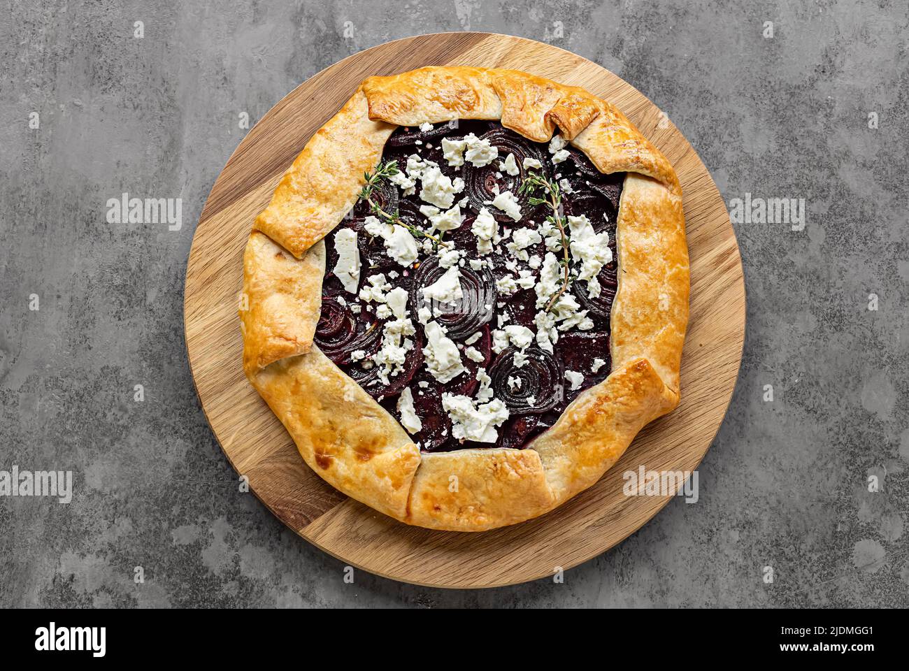 Savory root vegetable galette. Served with goat cheese Stock Photo Alamy