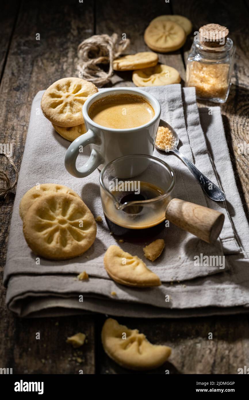 Delicious brekfast coffee with homemade cookies.Healthy snack with dried orange Stock Photo