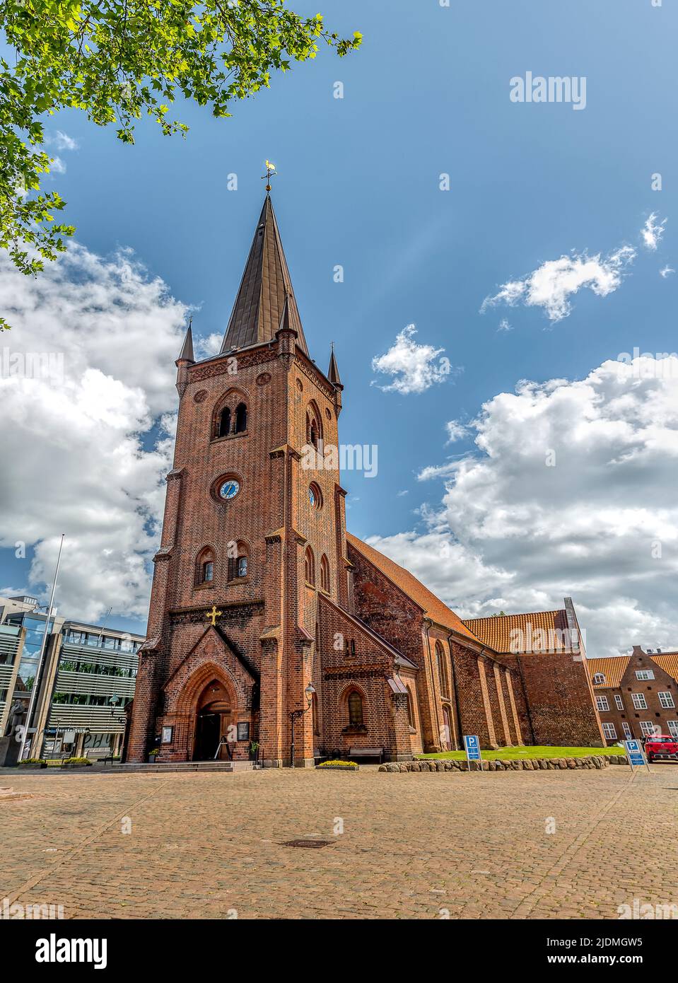 The red brick-Church of Sct. Nicolai in Vejle, Denmark, June 13, 2022 Stock Photo
