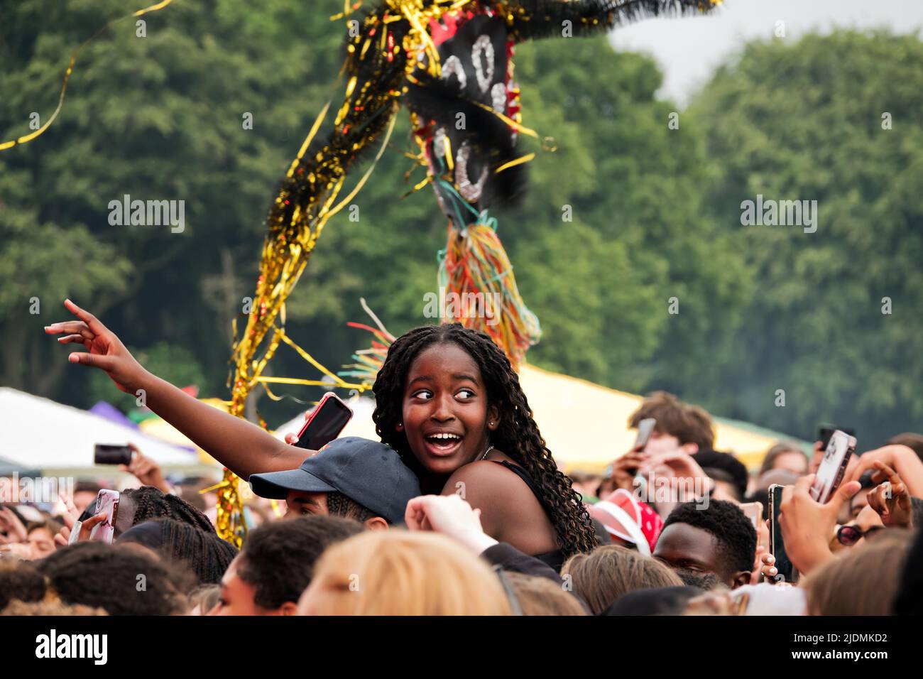 People in the crowd enjoying the music at the 2022 Africa Oye Music Festival in Sefton Park Liverpool UK Stock Photo