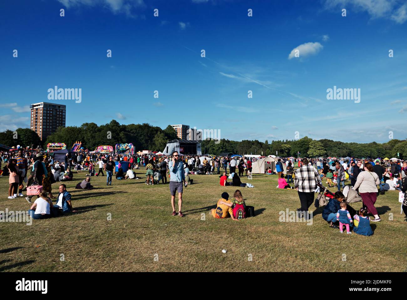 Huge crowd enjoying the music and sunshine at the 2022 Africa Oye Music Festival in Sefton Park Liverpool UK Stock Photo