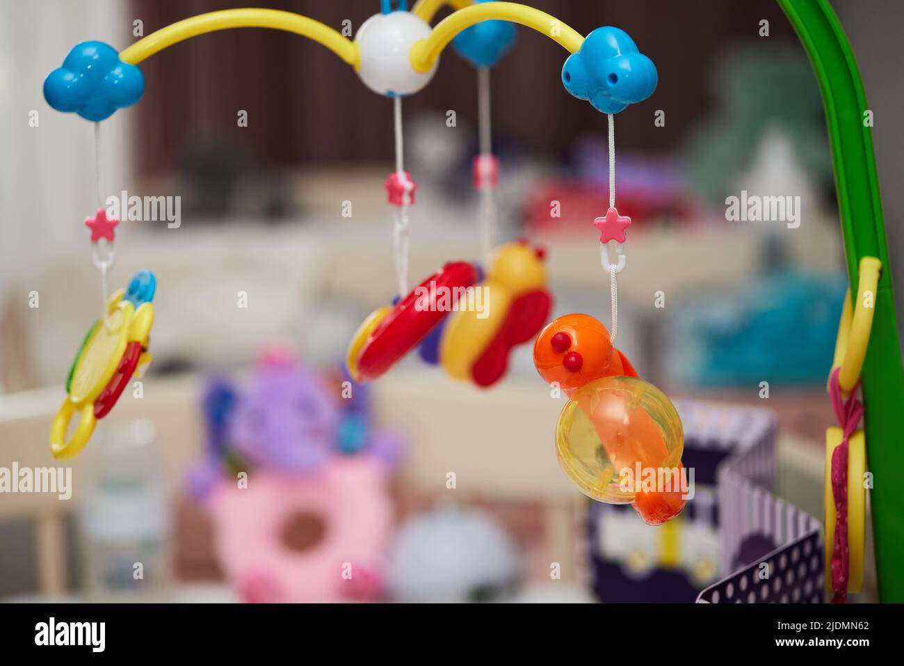 Baby mobile above the newborn crib Stock Photo Alamy