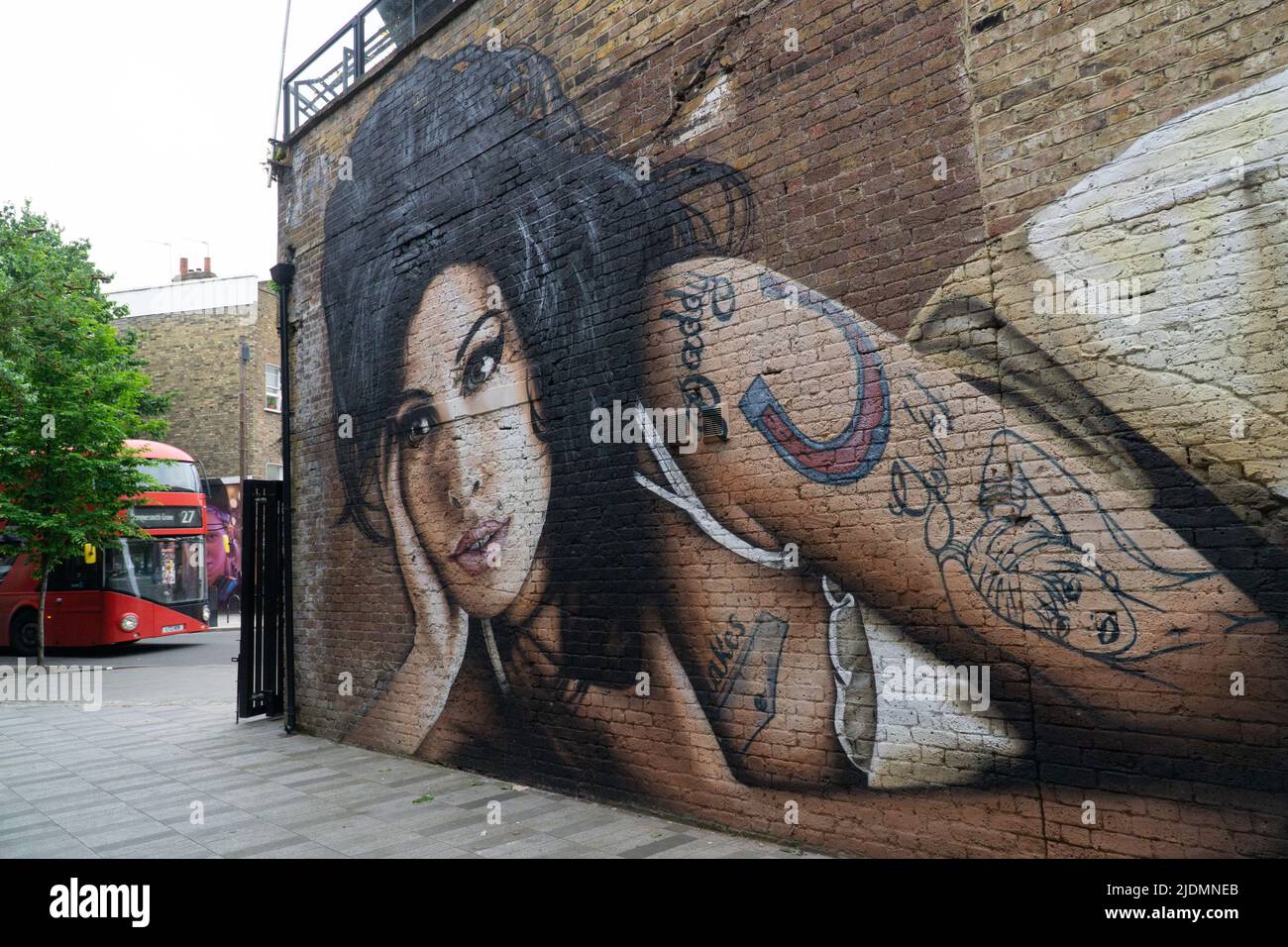 London, UK: Street artist JXC has painted a mural of Amy Winehouse on a brick wall at the side of the Hawley Arms pub in Camden. Anna Watson/Alamy Stock Photo