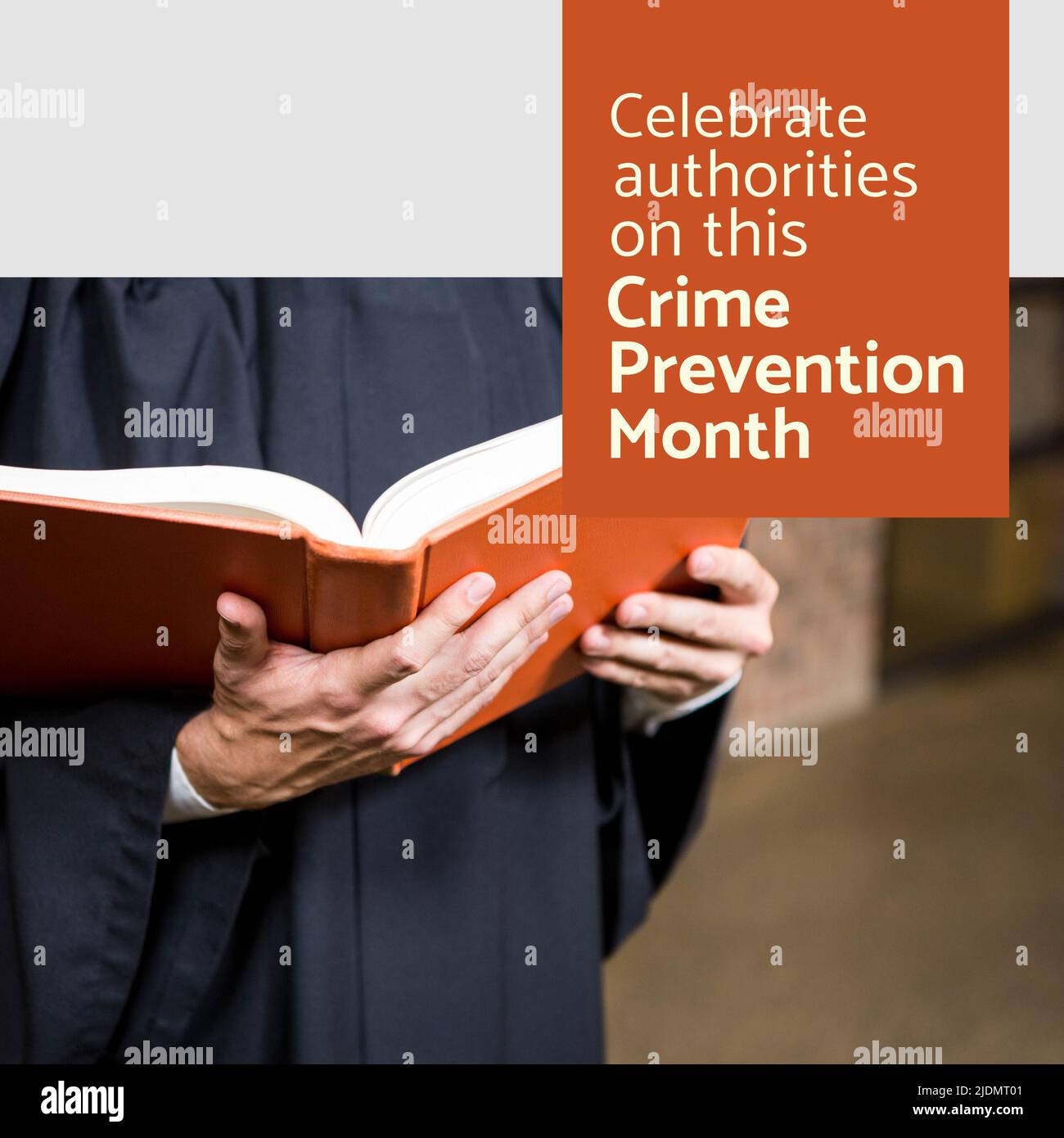 Midsection of caucasian lawyer reading book and celebrate authorities on this crime prevention month Stock Photo