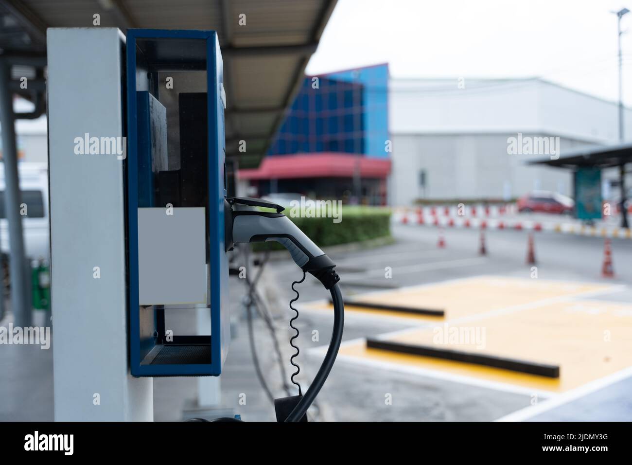 Electric car charging station. Power supply for electric car charging. Clean energy concept Stock Photo