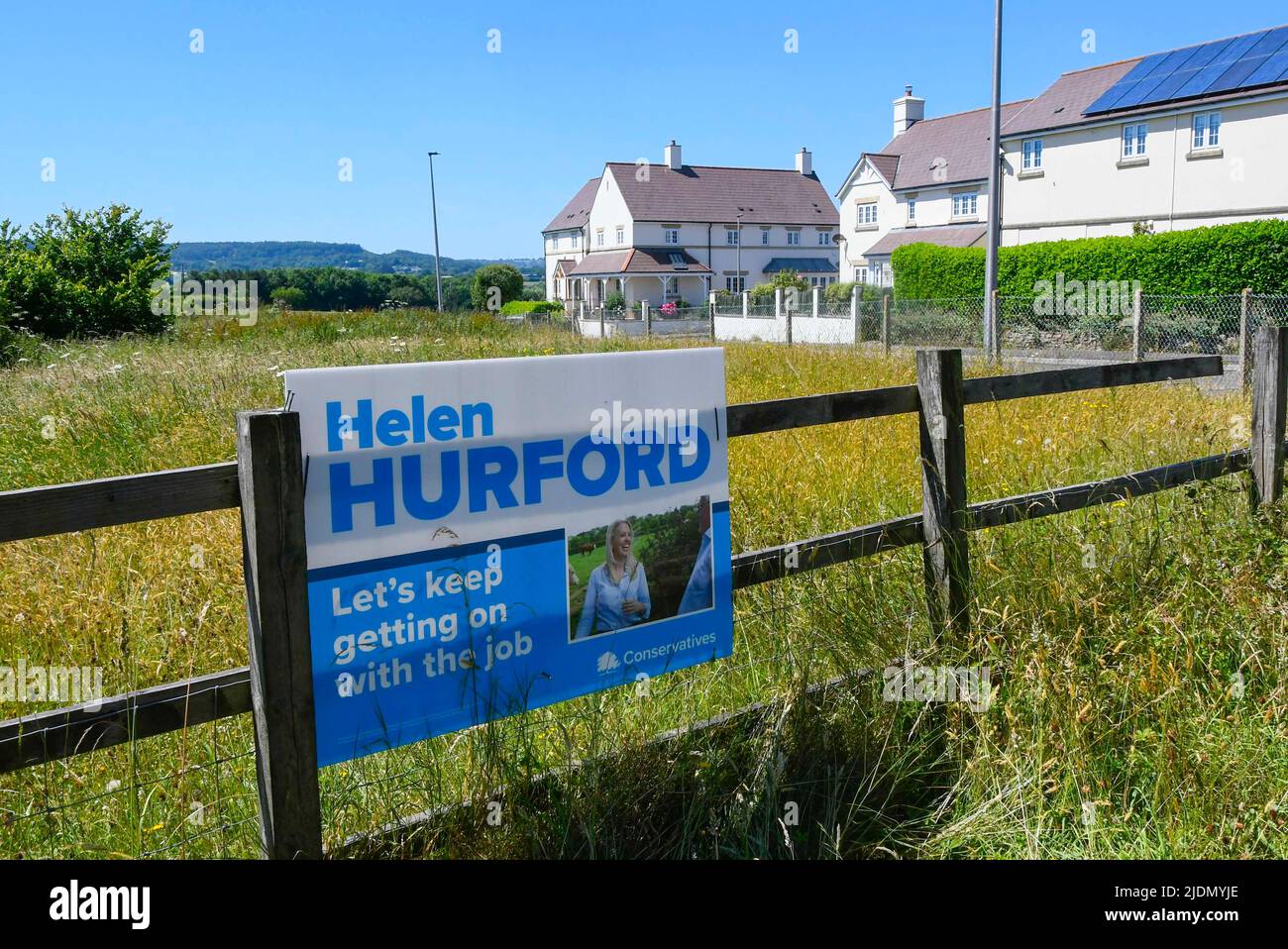 Axminster, Devon, UK.  22nd June 2022.  Election poster for the Conservatives candidate Helen Hurford at Axminster in Devon ahead of tomorrows parliamentary election for the Tiverton and Honiton constituency.  Picture Credit: Graham Hunt/Alamy Live News Stock Photo