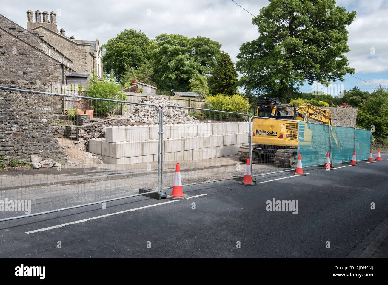 Completed blockwork now in  place at Kayley Hill, Long Preston where major work is taking place to repair a large wall ........20th June 2022. Stock Photo